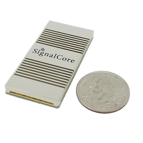 nanoSynth® 6 GHz SMT Synthesizer pictured with quarter for scale